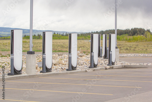 Banff, Alberta, Canada - May 21, 2025: New electric vehicle charging stations in the remote area of Kananaskis Alberta making long distance travel charging stations more available