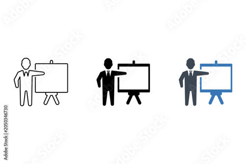 Businessman pointing to a blank whiteboard during a presentation in a clean office setting