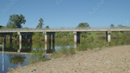 Footage of the Yarramundi Bridge over the Nepean River at the Yarramundi Reserve park near Angus Banks in the Hawkesbury region of New South Wales, Australia