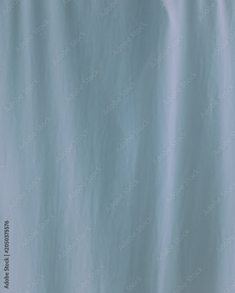 Obraz premium Abstract blue gradient texture background with soft vertical motion blur. Smooth flowing lines create a calm modern backdrop, ideal for minimal design, wallpaper, and digital projects. 
