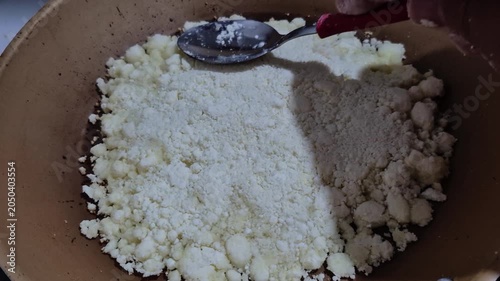 Preparing Traditional Paraguayan Mbeyu in a Frying Pan