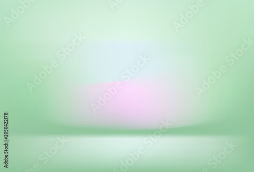 Soft green background with pink and blue gradient lighting effects on wall and floor studio setup for product photography
