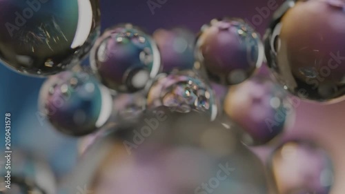 Abstract close-up of blurred metallic spheres and bokeh lights