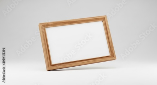 Wooden picture frame with blank white space on white background