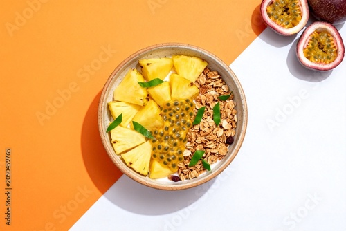 Vibrant Breakfast Bowl with Pineapple, Granola, and Passionfruit