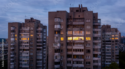 Canvastavla Kyiv city residential buildings standing against a cloudy evening sky, with inte