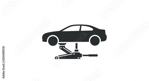 Fotografía Sedan car being raised by hydraulic jack for maintenance