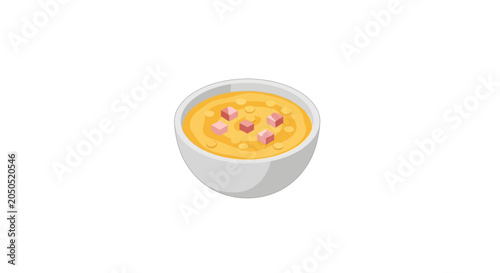 Creamy yellow soup with herbs in white bowl.