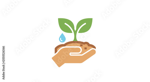 A hand holding a small green plant growing from a patch of soil