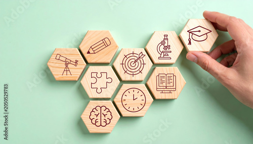 Quadro su tela Hand arranging wood block stacking with elements education icon