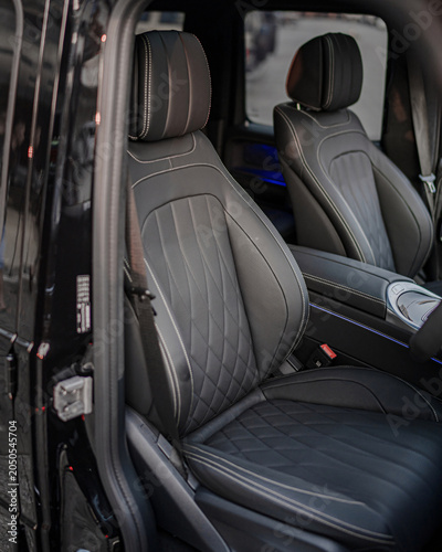 Konstfotografi Luxurious car interior with leather seats for premium cabin.