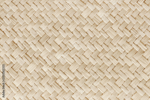 Pattern of reed weaving mat with vintage style for background and design art work.