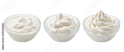 Quadro su tela Three glass bowls filled with whipped cream on transparent background