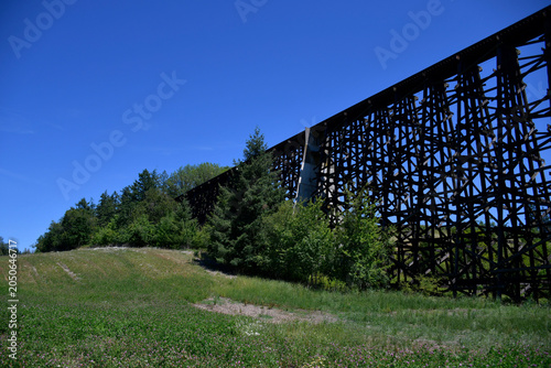 Historic Wooden Railroad Trestle with Grassy Hillside, Rural Oregon