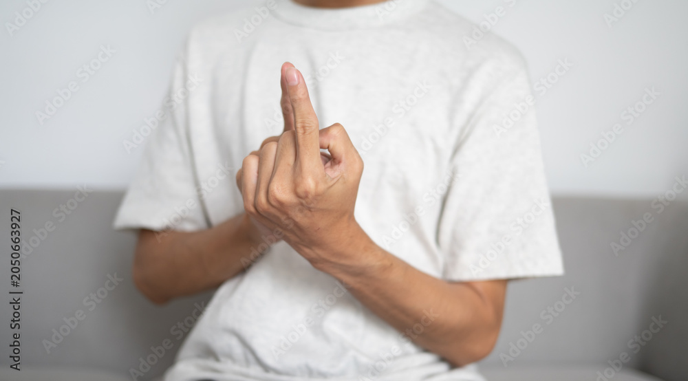 Fototapeta premium Close up of deaf man using sign language for ASL communication and learning concept.