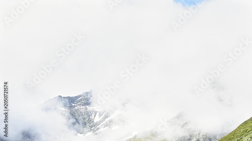 Schwarzhorn wrapped by fogs, Pizzo Suretta landscape in the Montespluga range
