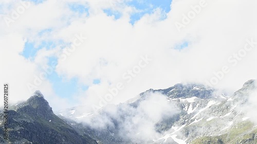 Moving clouds above the Schwarzhorn in the Pizzo Suretta massif, Montespluga pass, Alps landscape