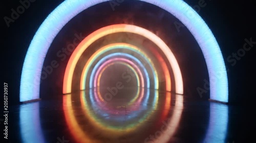 Colorful illuminated tunnel with vibrant neon arches reflecting on wet floor, creating a mesmerizing visual experience in a darkened environment