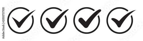 Bild auf Leinwand Selection of four black check mark signs inside circles isolated on a white background image