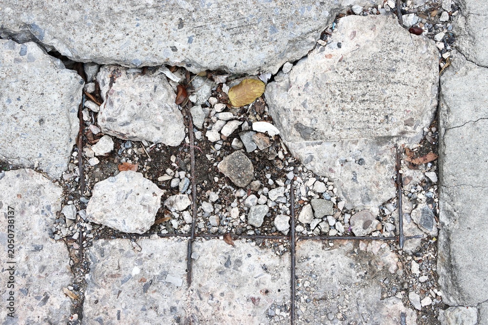 Fototapeta premium Broken and damaged concrete road background