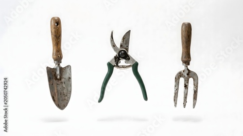Gardening Tools: Trowel, Pruners, and Fork on White Background
