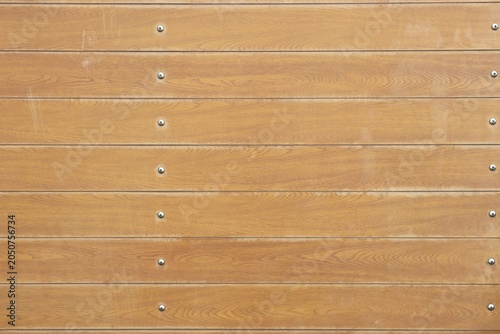 Old wooden boards wall with screw pattern background