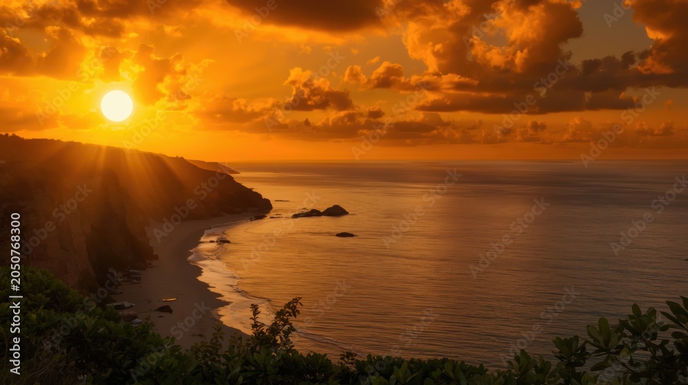 Obraz premium Beautiful golden sunset over the ocean coast with dark clouds and calm sea water in a tropical paradise