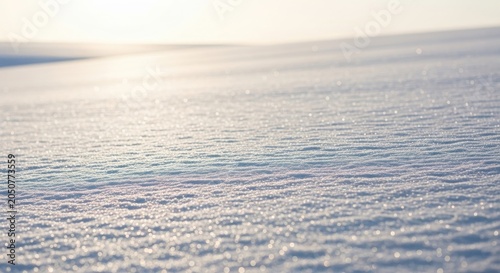 Sunlight glinting on a vast snow-covered field