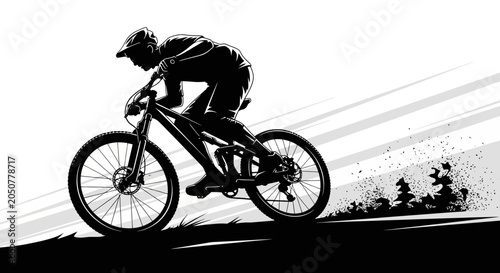 Silhouette of a Mountain Biker Descending a Steep Trail.