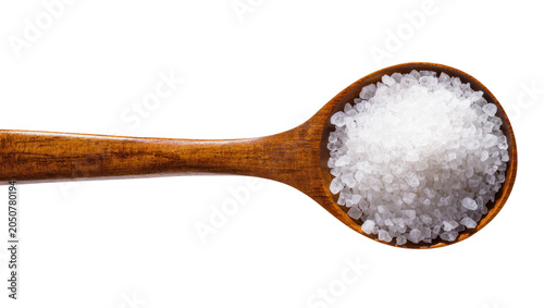 Canvas Print Wooden spoon filled with coarse sea salt crystals
