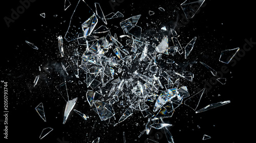 Dramatic exploding crystal glass fragments flying apart violently through dark space creating dynamic sharp transparent shards scattering against pure black background