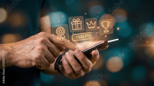 Customer loyalty program on smartphone, digital reward points and gift icons, person using mobile app for shopping bonuses and membership benefits