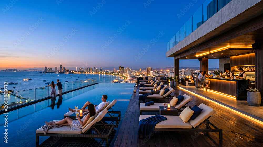 Obraz premium Stunning luxury resort rooftop infinity pool overlooking magnificent vibrant city skyline and calm ocean bay during amazing spectacular colorful summer sunset evening