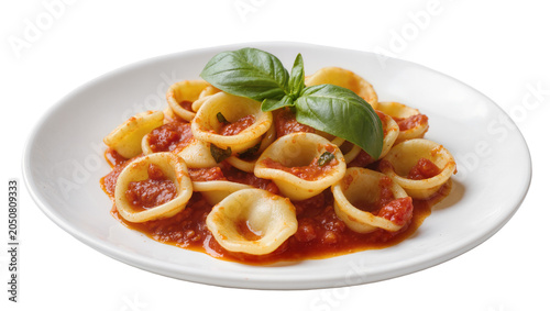 Принти на полотні Orecchiette pasta with tomato sauce and basil leaves on white plate