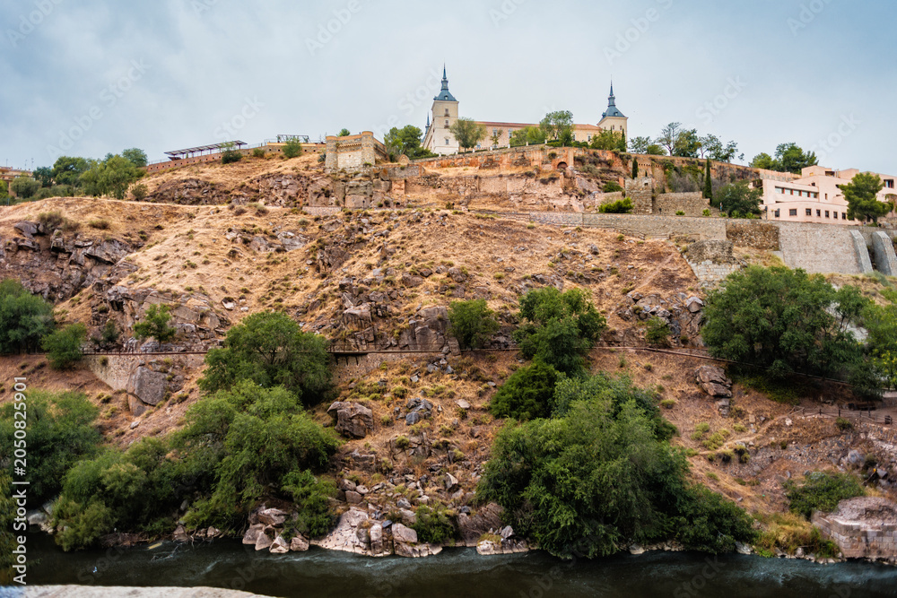 Fototapeta premium Toledo historic city with Alcazar overlooking Tagus River