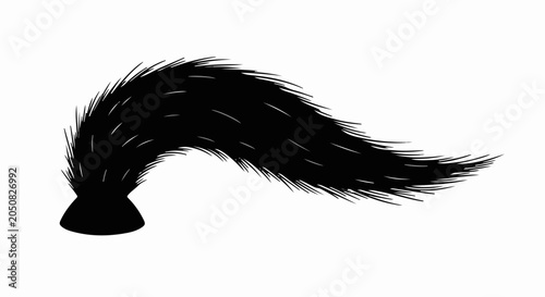 Fluffy black animal tail with a curved shape against a white background