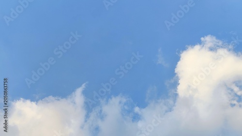 Fresh Atmospheric Cloudscape on a Clear Sunny Day