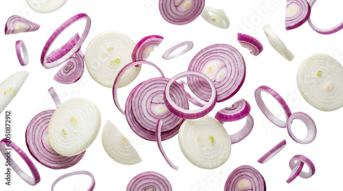 A collection of fresh red onion slices and rings floating in the air against a solid , for culinary food concepts isolated on a transparent background