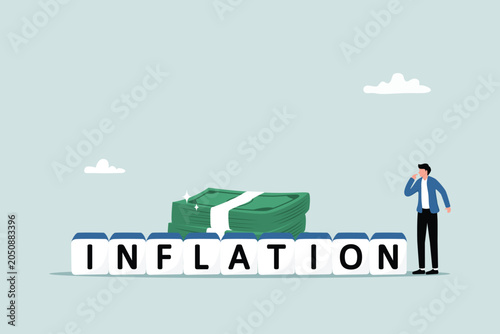 Bilde på lerret Economic inflation means money buys less than in the previous period, businessmen stand and think wisely with cube blocks combined with the word Inflation