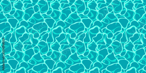 Bild auf Leinwand Ripples on a serene pool of turquoise water reflecting sunlight