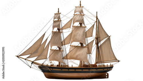 Foto Wooden sailing ship model with full sails and rigging