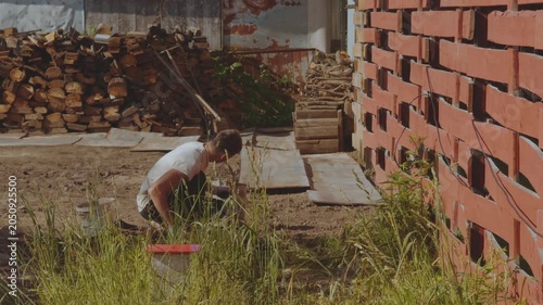 Weeding the ground, weeding the soil, clean the soil of weeds, remove weeds in the soil