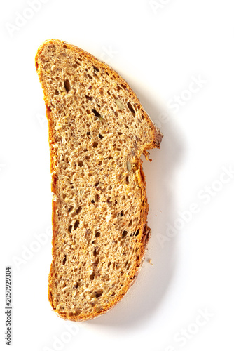 Slice of fresh artisan sourdough bread isolated on a clean white background