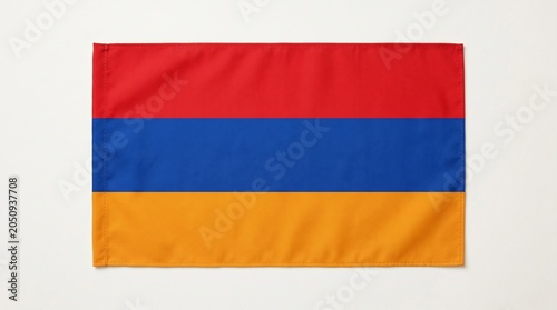 National flag of Armenia with red, blue, and orange horizontal stripes, design symbolizes resilience, heritage, and unity, reflecting the nation’s cultural identity and enduring strength.