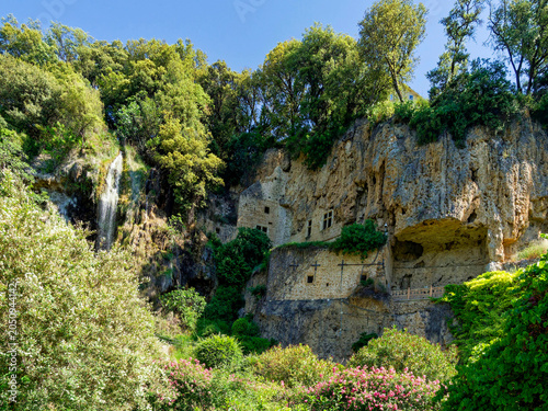 The waterfall, park, and troglodytic caves of Villecroze in Provence, in the Haut-Var region, are nestled in a verdant cirque surrounded by a cliff, a foothill of the Alps