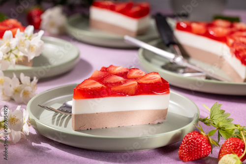 Strawberry mousse cake slice with jelly topping