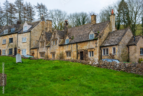old english village in Cotswolds, with the classic cottages in oolitic yellow stone