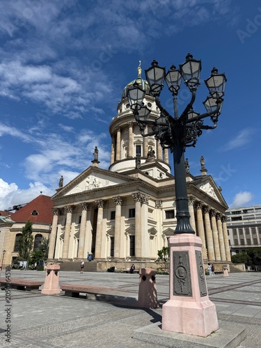 Εκτύπωση καμβά The Französischer Dom at Gendarmenmarkt in Berlin rises with refined symmetry, i