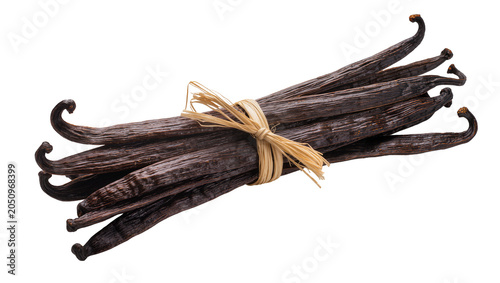 Foto Bundle of dark brown vanilla beans tied with raffia string