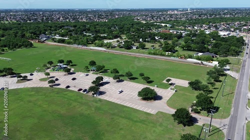 Playground, basketball court, adjacent residential streets, colorful equipment forming clear recreational hub surrounds Webb Community Park anchors Mansfield Webb Rd corridor, South Arlington, TX